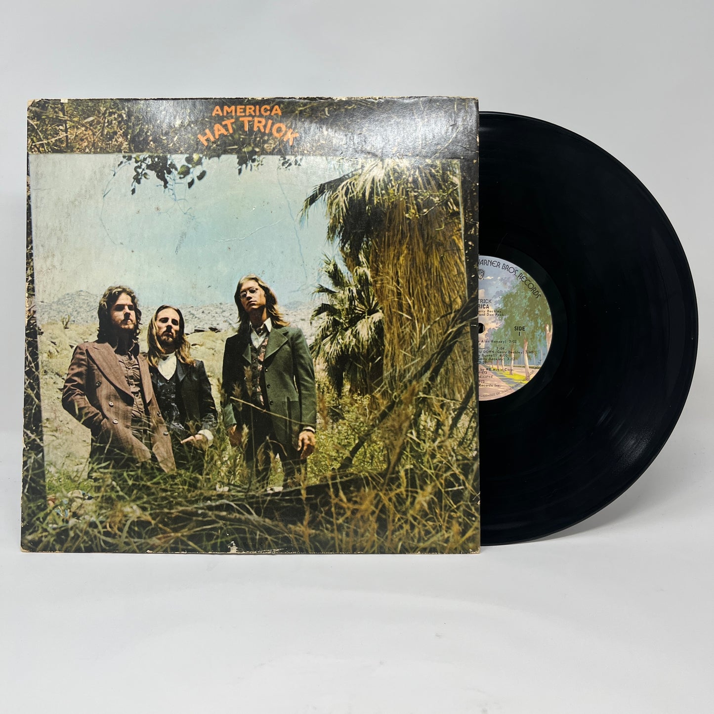 America (2) : Hat Trick (LP,Album)