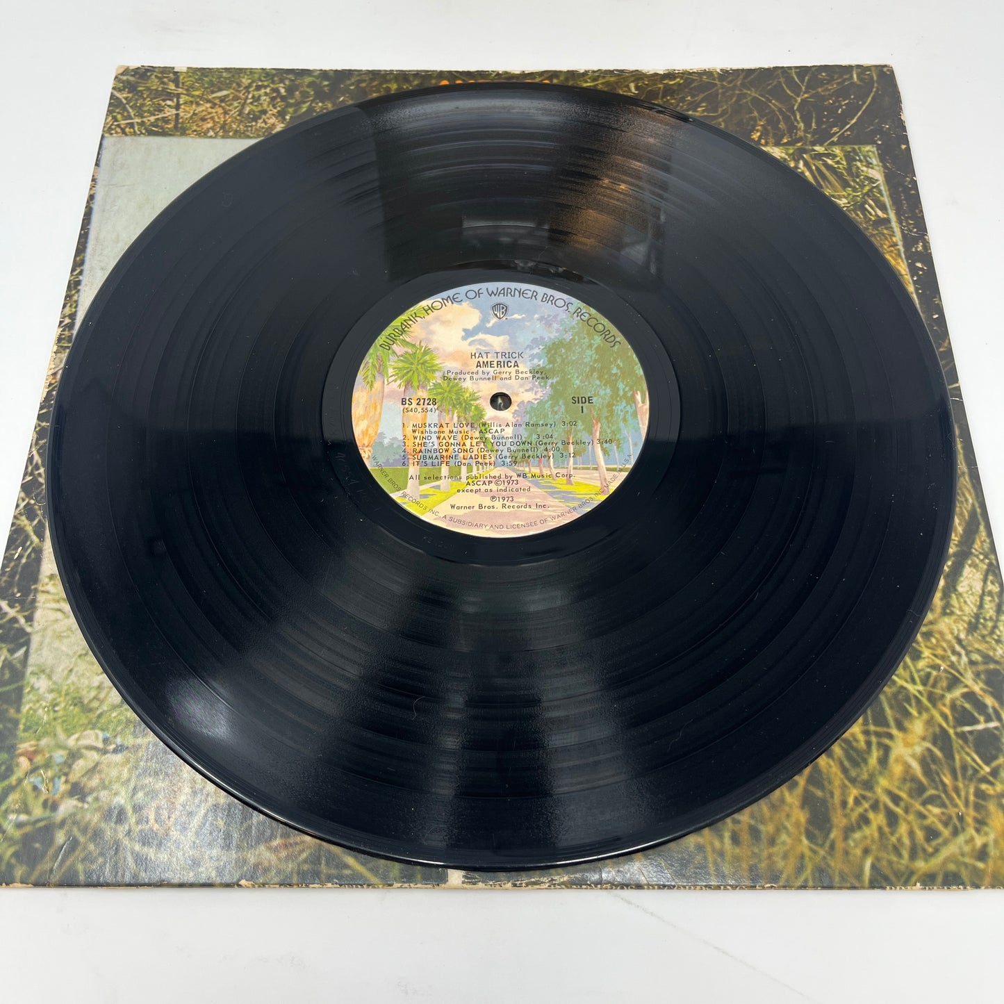 America (2) : Hat Trick (LP,Album)
